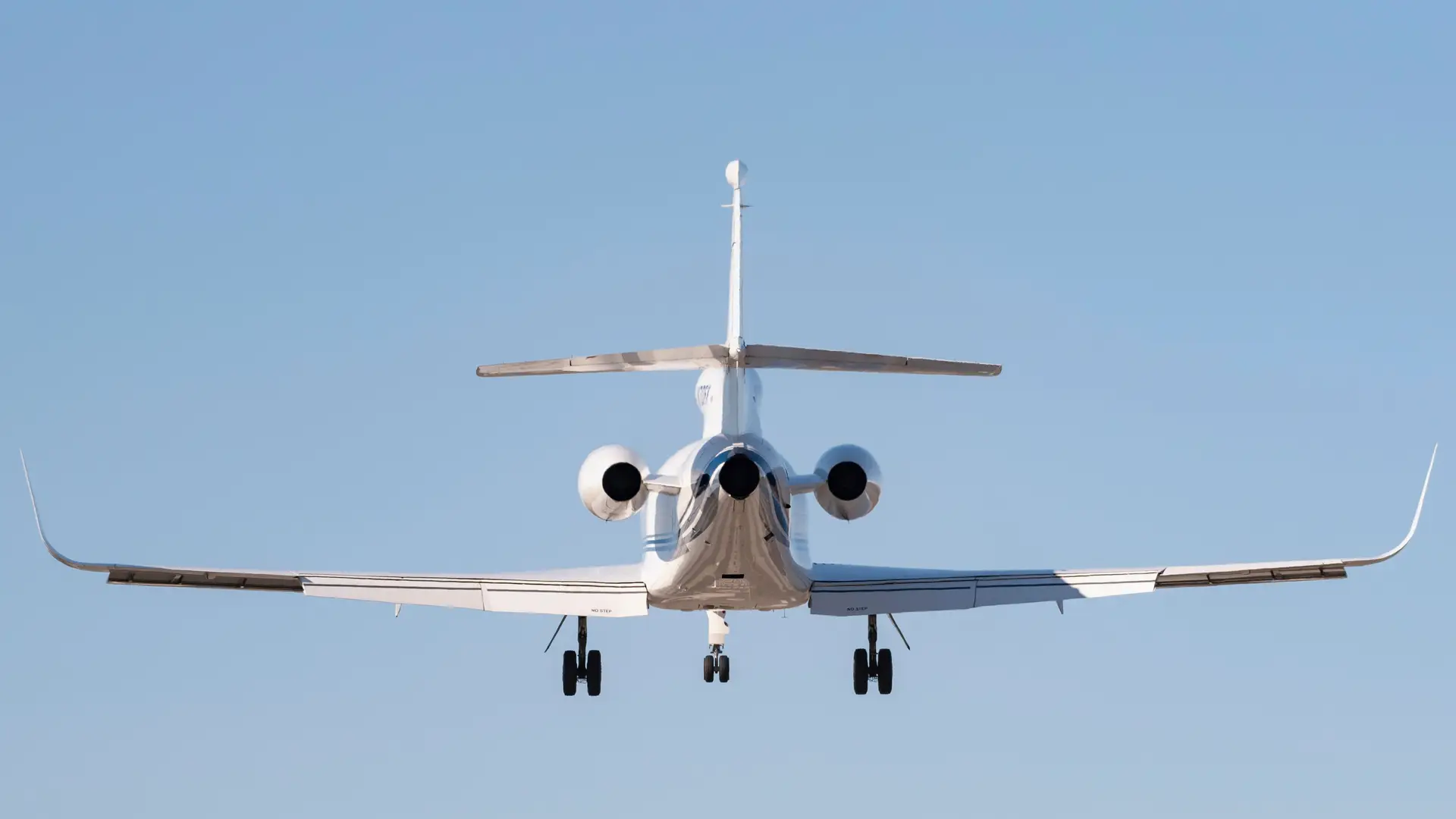 Business jet on approach with landing gear extended