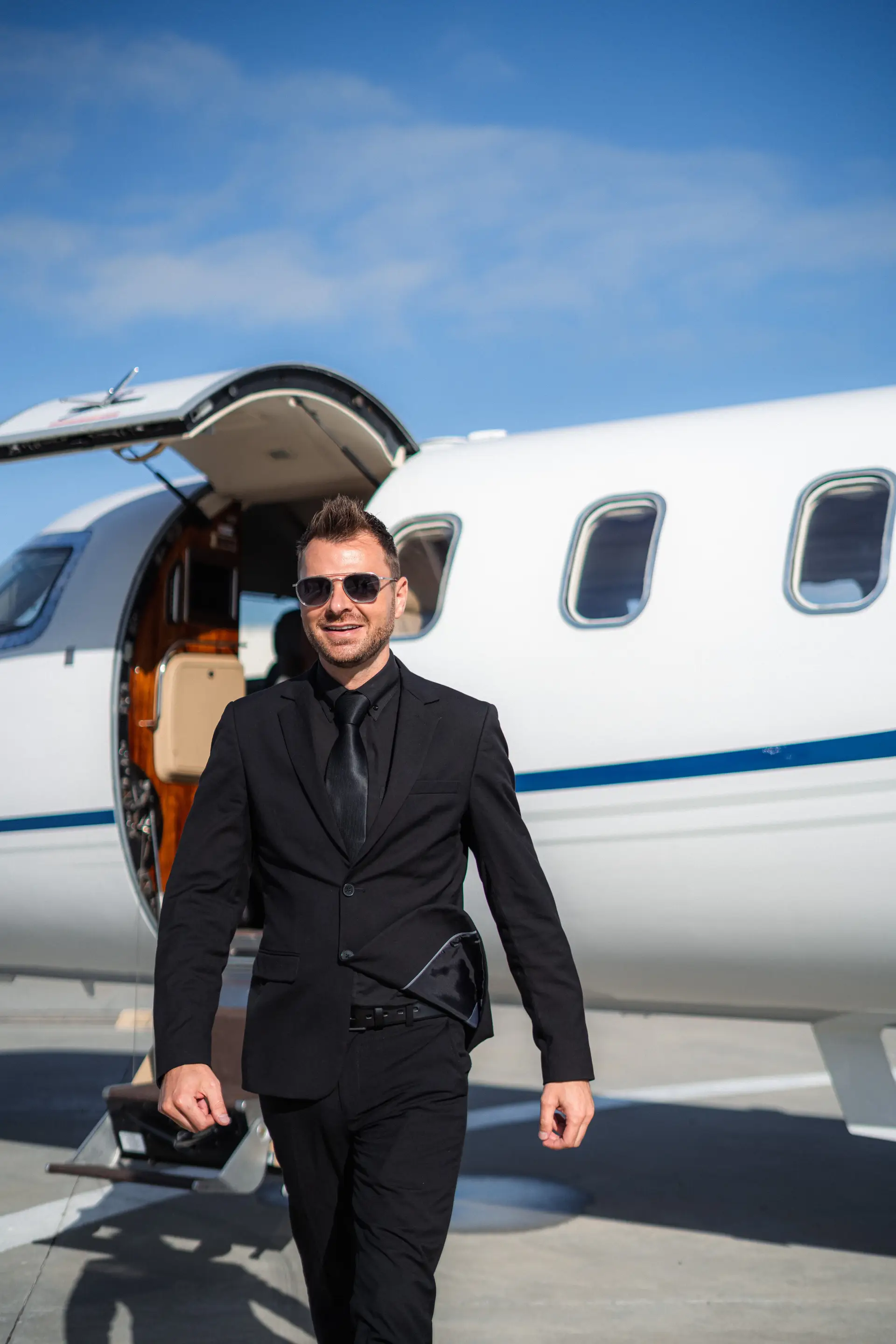 Executive passenger boarding aircraft with precision