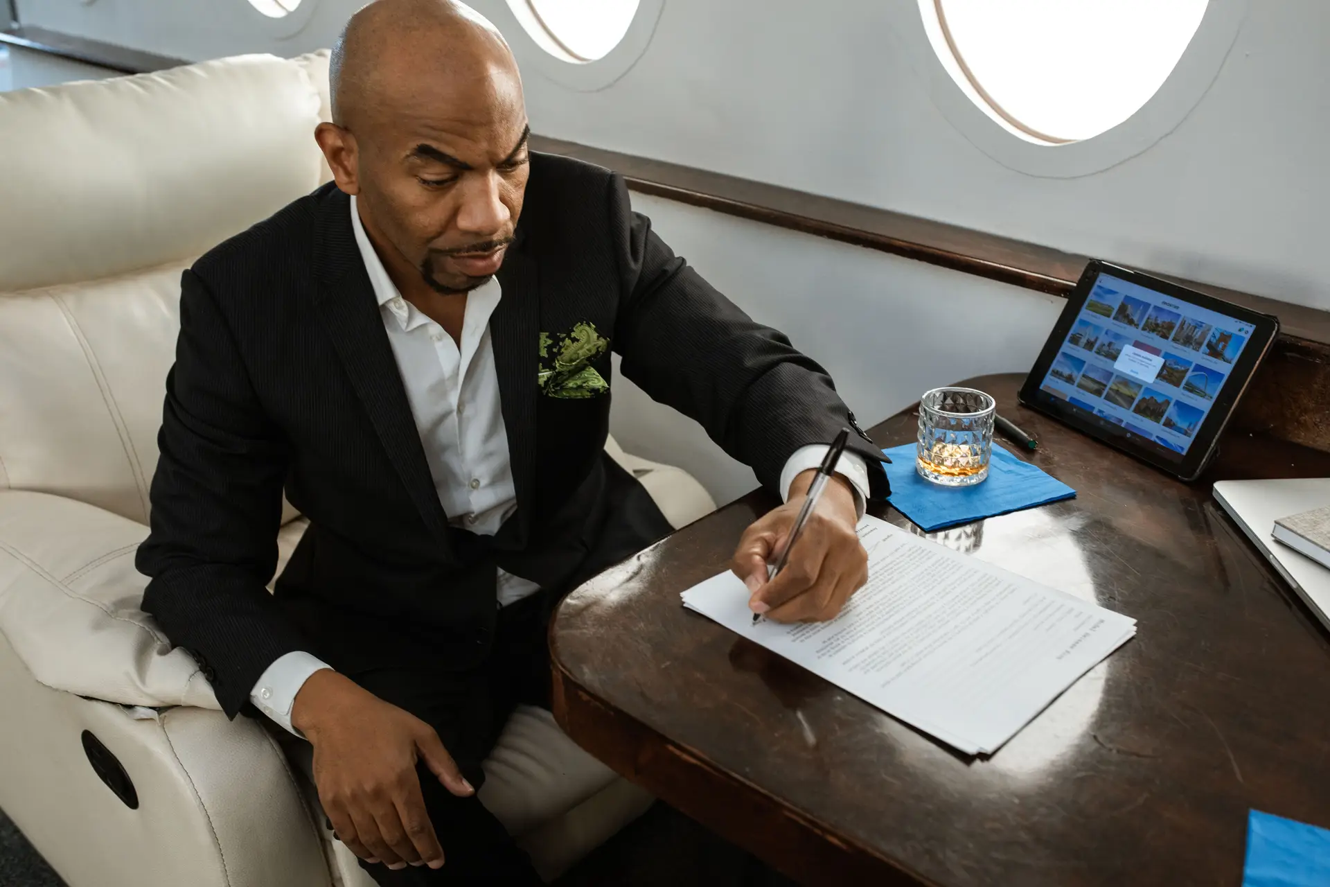 Concierge specialist reviewing complex aviation itinerary documents